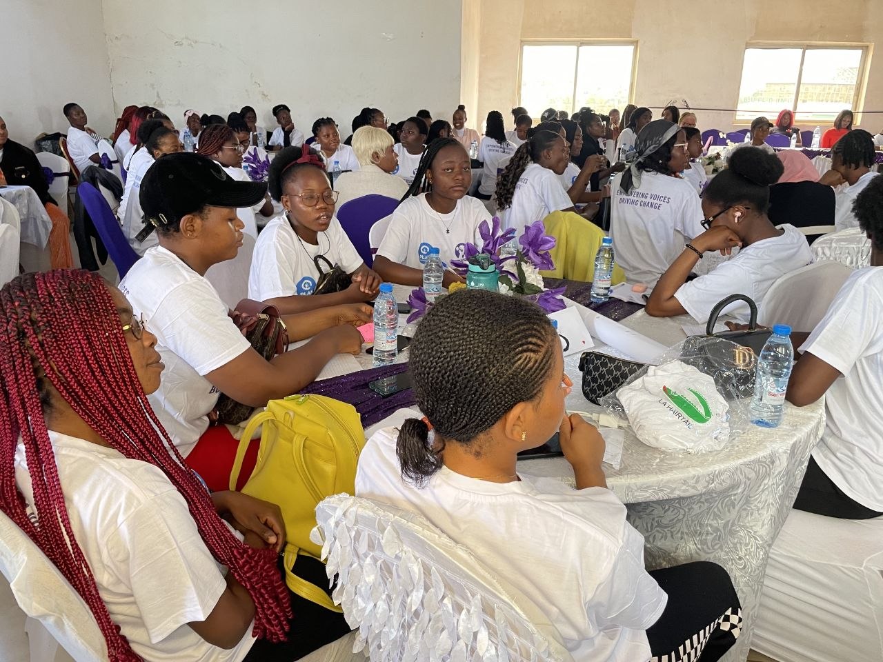 Girls and young people participating in civic engagement and leadership activities